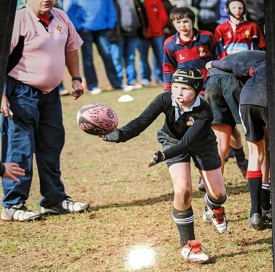 Neve playing mini rugby with Ballymena RFC