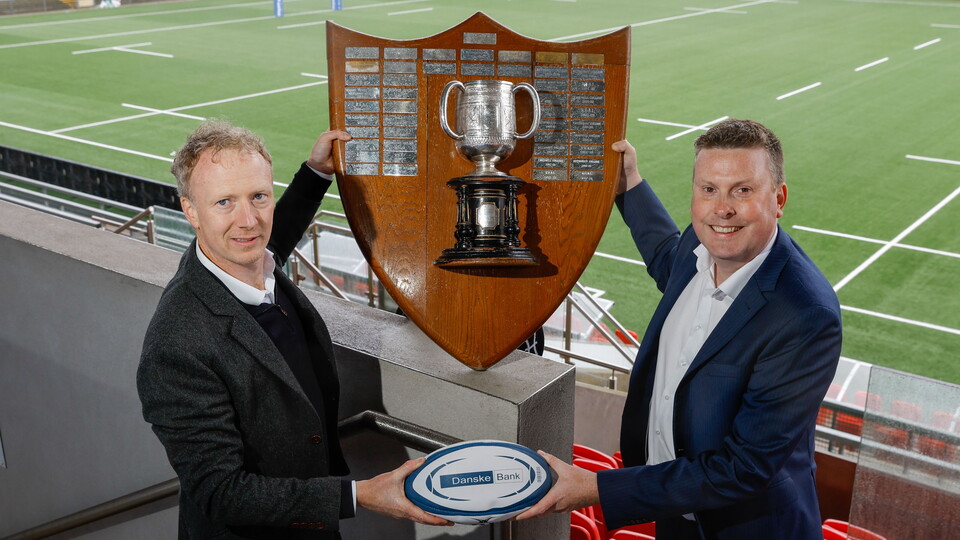 Keith Shorten, Head of Commercial at Ulster Rugby and Phil Smyth, Managing Director of Commercial Development at Danske Bank, pictured at Kingspan Stadium with the renowned Danske Bank Ulster Schools’ Cup trophy.