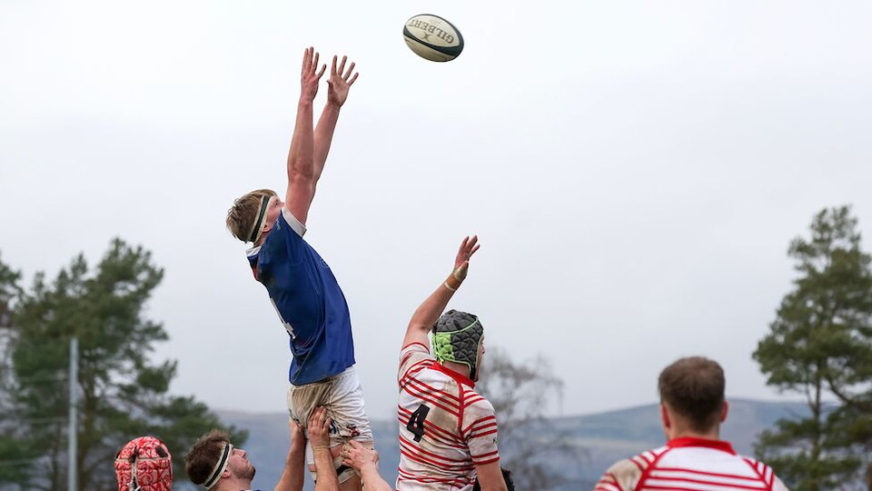 Charlie in action for Queen's University, 2023.