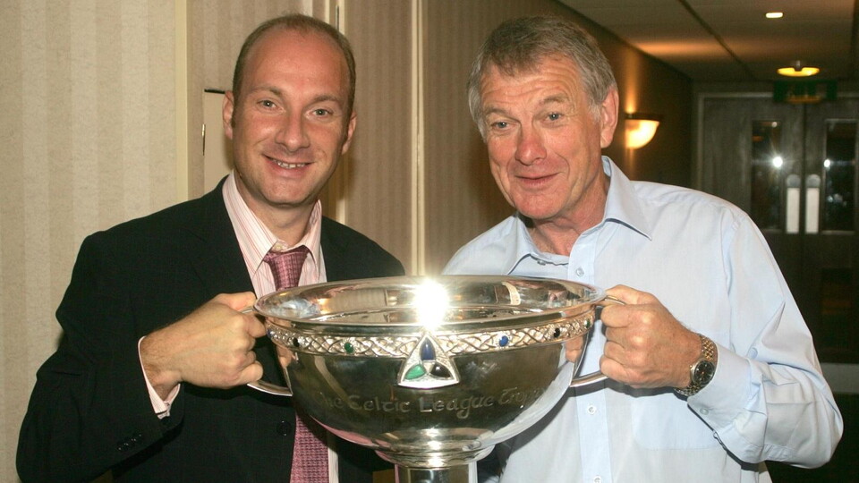 Stephen Watson MBE (left) celebrates Ulster's 2006 Celtic League win alongside father, Cecil (right).