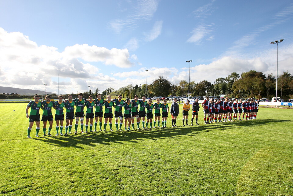 A minute's silence is held ahead of Hinch v Belfast Harlequins in October 2012.