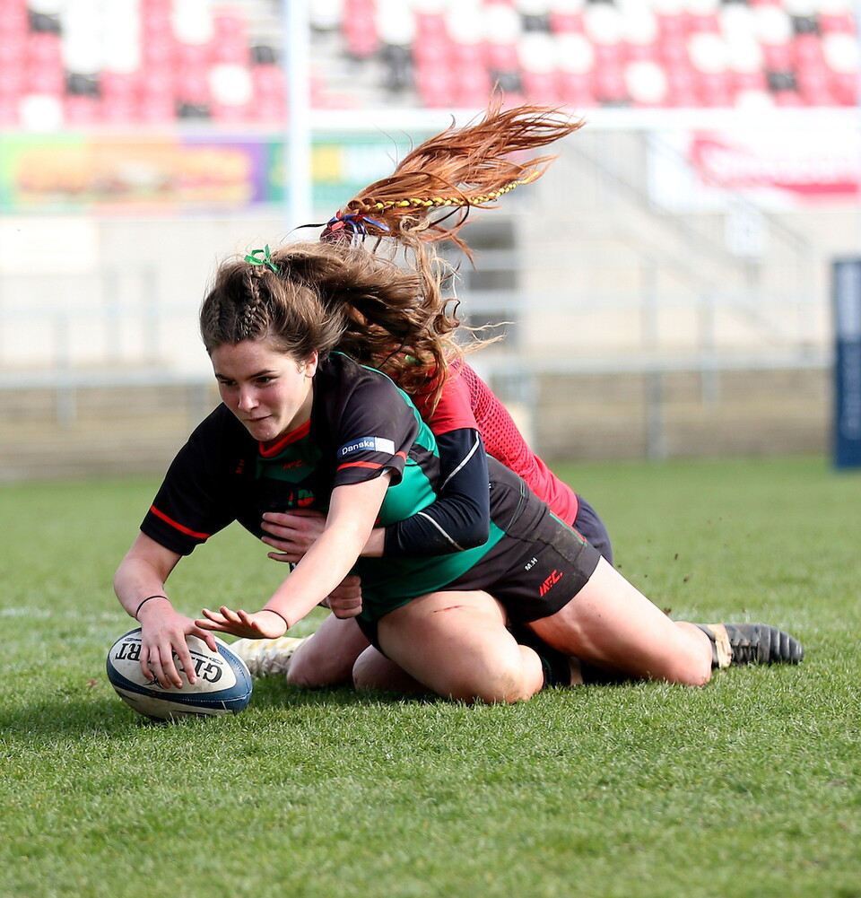 Moya Hill scoring for Erne Integrated College in the 2020 Danske Bank Ulster Girls' Schools' Cup.