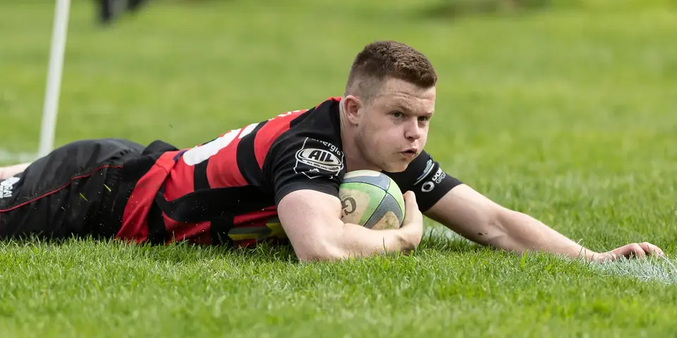 Shea O'Brien scoring a try for City of Armagh
