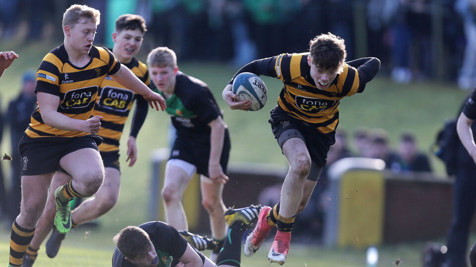 Postlethwaite on the charge for RBAI in the Danske Bank Schools' Cup, 2018.