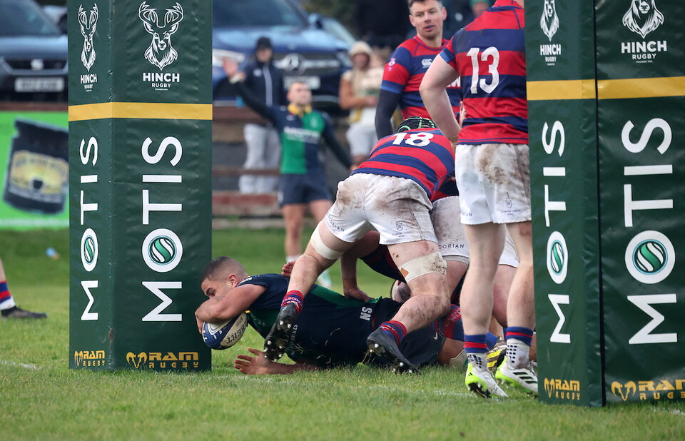 Cormac Izuchukwu scoring a try for Ballynahinch in the AIL