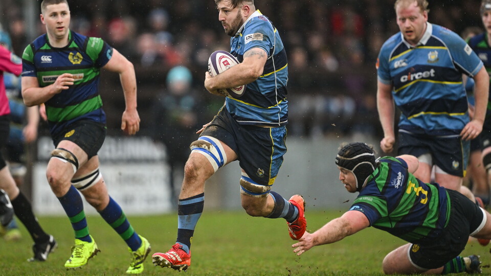 Dromore captain Ryan Hughes makes a break through the Seapoint defence during last season's Energia All-Ireland Junior Cup Final