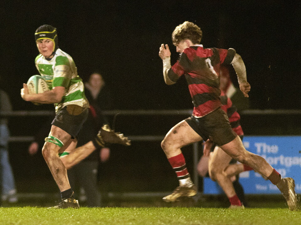 The first of this season’s Group Stage B games got underway in the Nutty Krust U18 Tournament under the floodlights at a cool, and damp, Chambers Park when Omagh U18s team played Rainey RFC U18s on Wednesday evening.